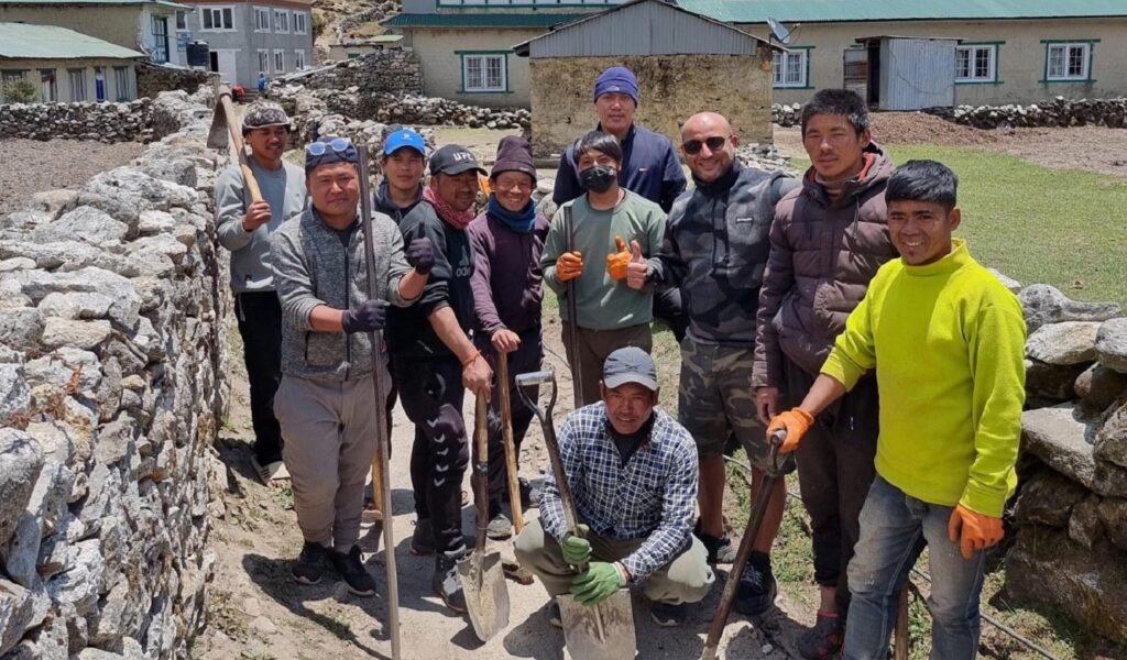 Workers with spades posing for a photo